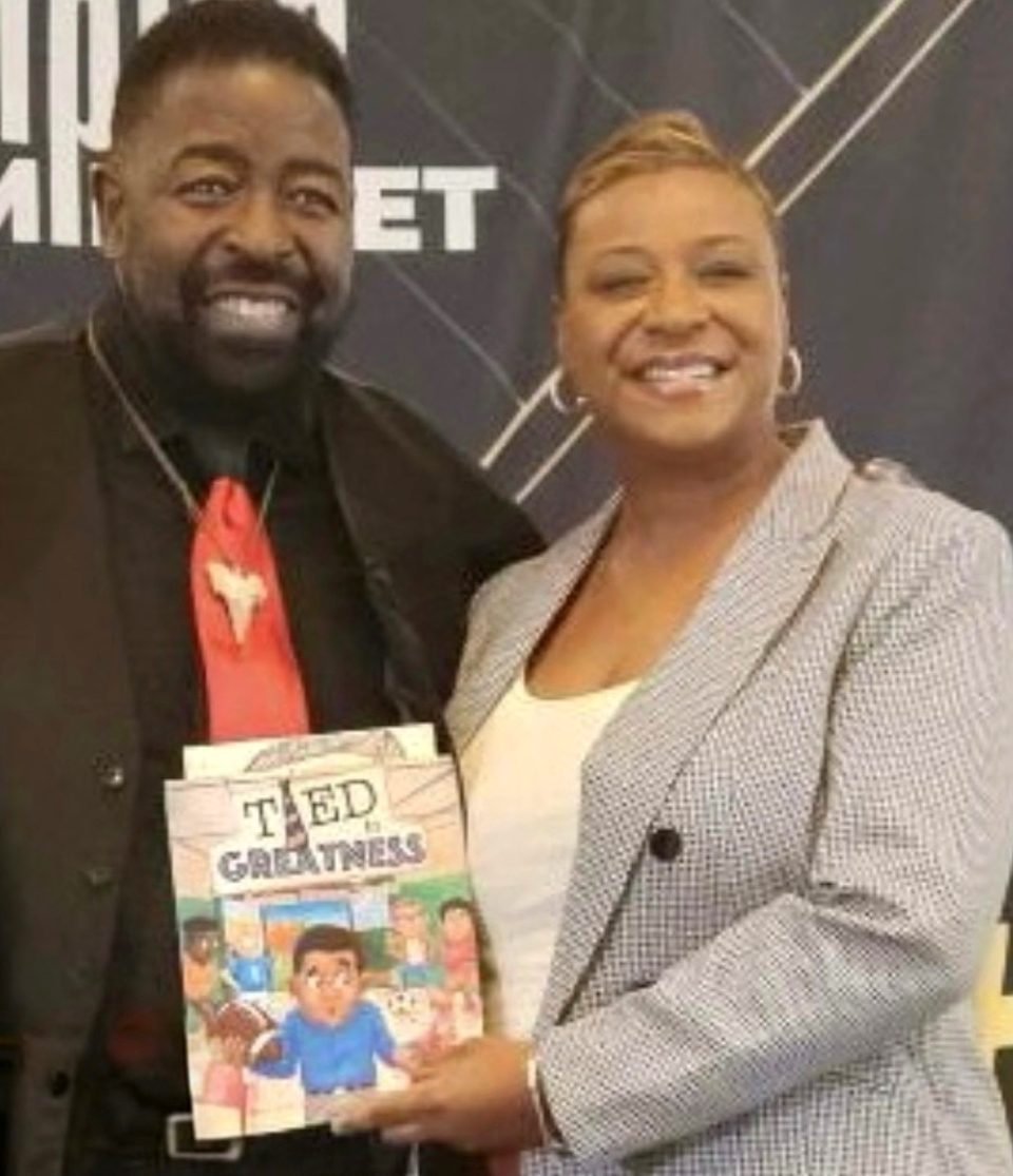 Dr. Serena Brown Travis with her father, Les Brown.
