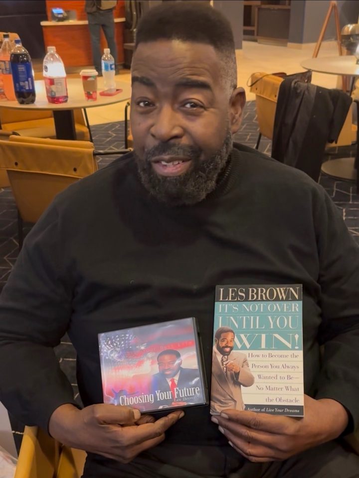 Les Brown holding It's Not Over Until You Win and Choosing Your Future.